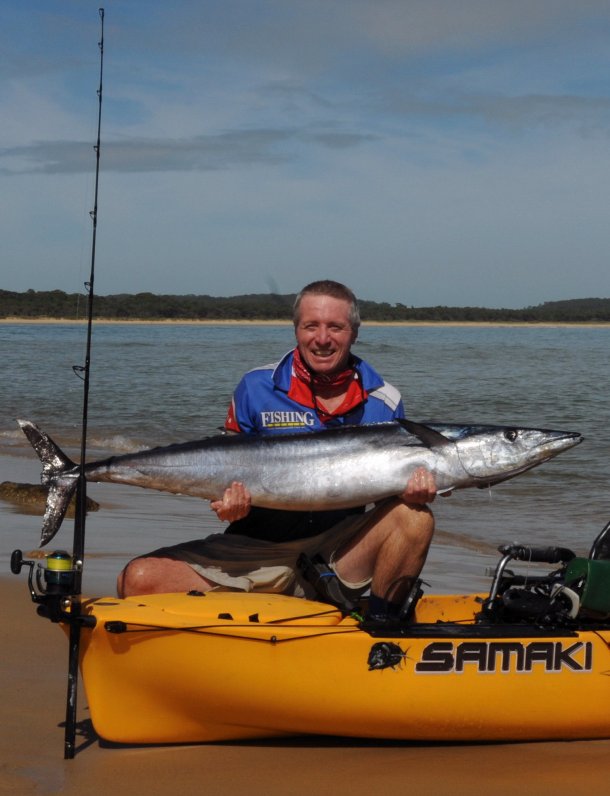 Chris Cleaver with his recently caught and released hybrid cod he likes to call a Murrout (cross between a Murray and trout cod).